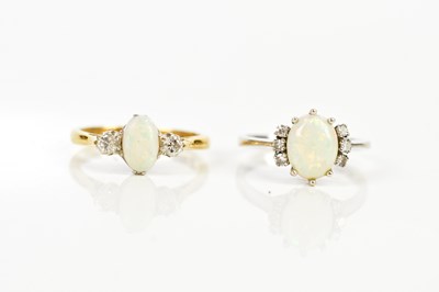 Lot 2396 - An 18ct white gold diamond and opal set dress...