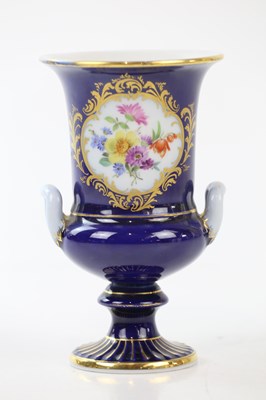 Lot 2449 - MEISSEN; a cobalt blue ground twin handled...