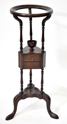Lot 42 - An Edwardian mahogany three-tier shaving stand...