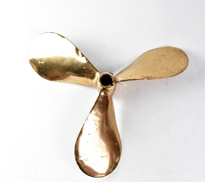 Lot 669 - A vintage brass ship's three-blade propeller,...