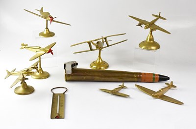 Lot 558 - A brass model of a Spitfire on stand to...
