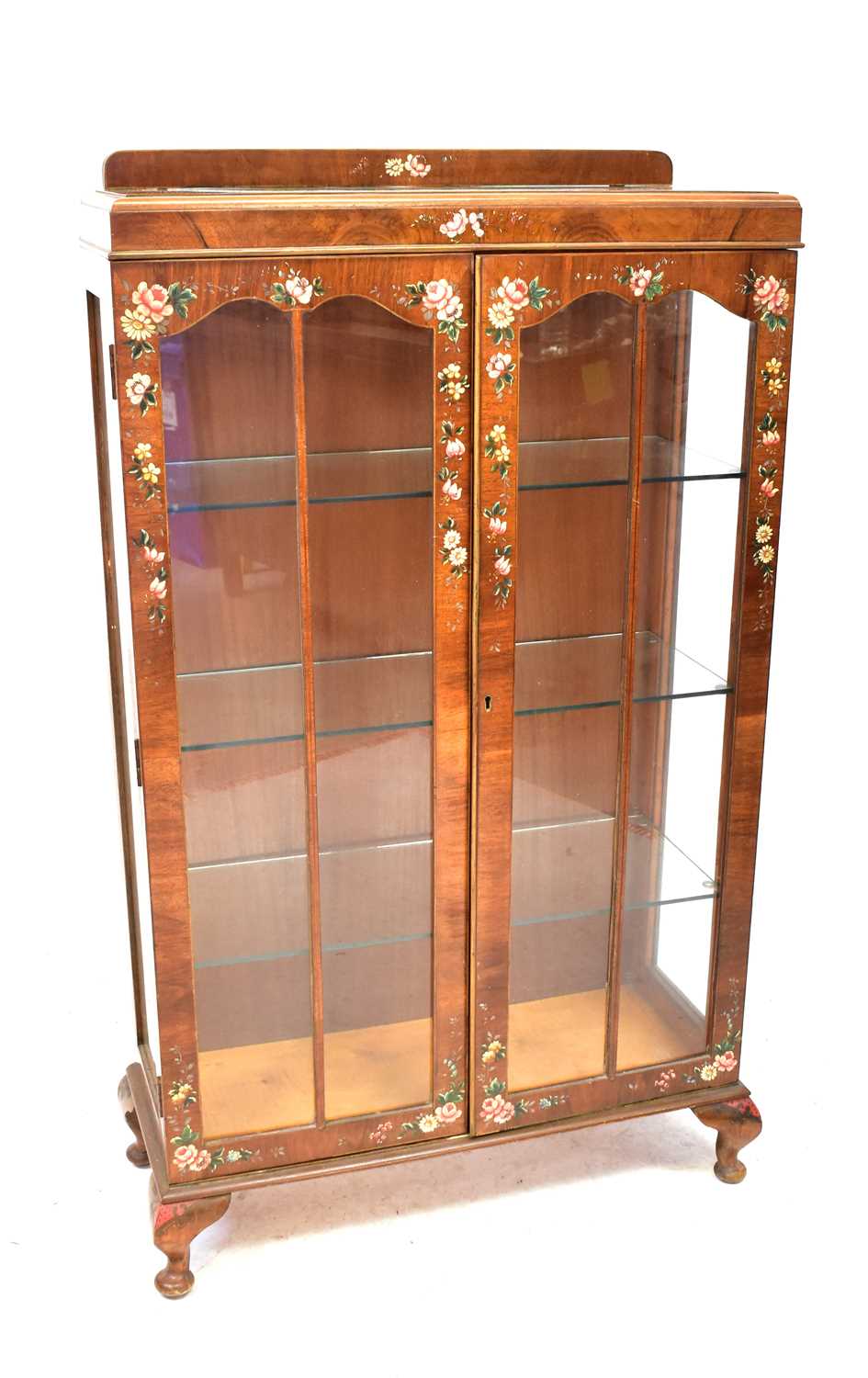Lot 11 - A vintage mahogany two-door display cabinet...