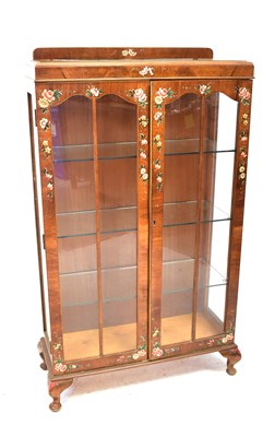 Lot 11 - A vintage mahogany two-door display cabinet...
