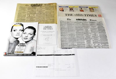 Lot 877 - A commemorative copy of The Times newspaper...