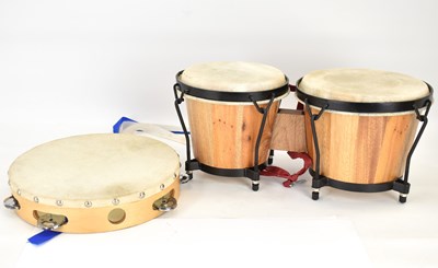 Lot 843 - A pair of Bongoset bongos, 18 x 20cm, and a...