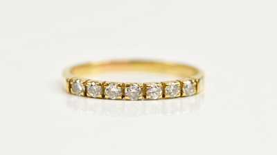 Lot 1463 - BOODLE & DUNTHORNE; an 18ct gold half hoop...