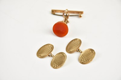 Lot 342 - A pair of 9ct gold cufflinks with engine...