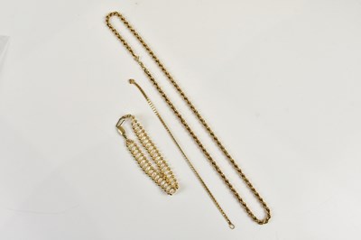 Lot 272 - A yellow metal twist link necklace, stamped...