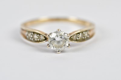 Lot 2435 - A yellow metal dress ring stamped 375 set with...