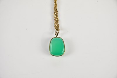 Lot 2468 - A chrysoprase pendant on a 9ct yellow gold...