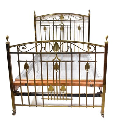Lot 38 - An Art Nouveau brass double bedstead with...