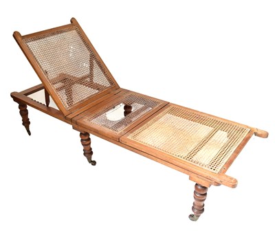 Lot 39 - An Edwardian mahogany bergère daybed with...