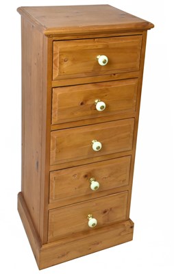 Lot 1740 - A modern pine chest of five drawers on plinth...