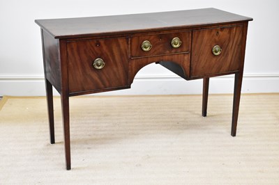 Lot 85 - A George III mahogany sideboard, with three...