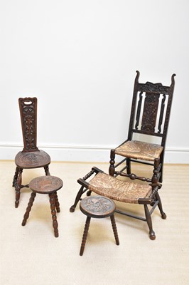 Lot 32 - A carved oak rush seated hall chair, an oak...