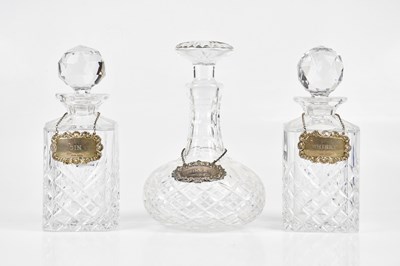 Lot 2226 - Three cut glass decanters with hallmarked...