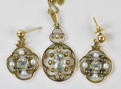 Lot 2461 - An Edwardian yellow metal pendant set with...