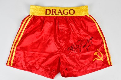 Lot 2711 - DOLPH LUNDGREN (IVAN DRAGO); a pair of signed...