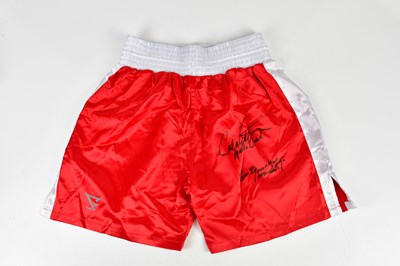 Lot 2715 - CARL WEATHERS (APOLLO CREED); a pair of red...