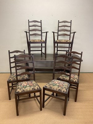 Lot 660 - ERCOL; a dark stained table, length 180cm,...