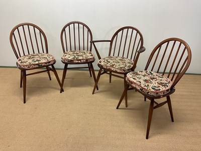 Lot 671 - ERCOL three dark stained dining chairs and a...