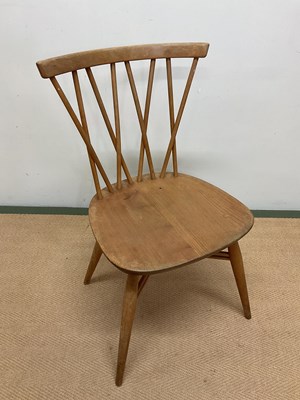 Lot 709 - ERCOL; a candle stick dining chair, height 79cm.