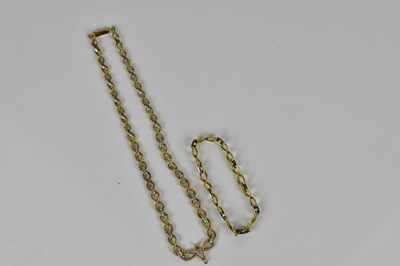 Lot 2446 - A yellow metal diamond set rope twist necklace,...