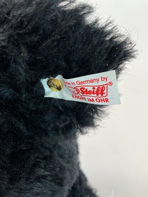 Lot 65 - STEIFF; a large black bear, white tag 664618...