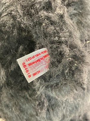 Lot 65 - STEIFF; a large black bear, white tag 664618...
