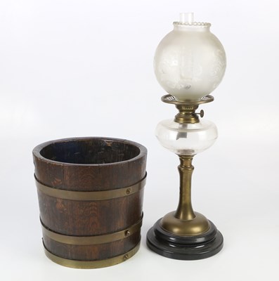 Lot 836 - A 20th century brass oil lamp with replacement...
