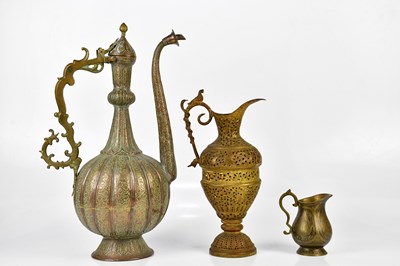 Lot 1309 - A large Persian ewer, height 49cm, together...