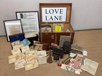 Lot 23 - A wooden trunk of collectors' items, to...