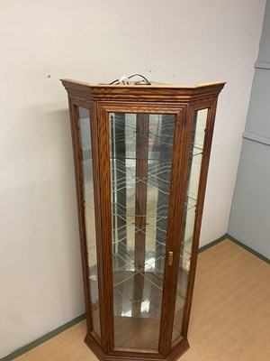 Lot 685 - A contemporary mirrored and glazed corner...