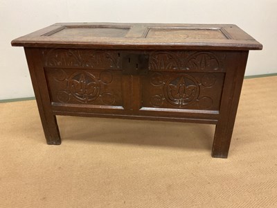Lot 652 - An oak coffer on raised stile legs, height...