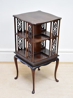 Lot 151 - An Edwardian mahogany revolving bookcase with...