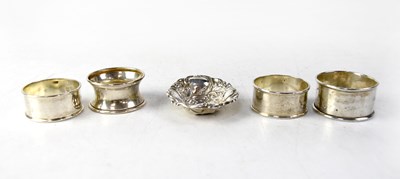 Lot 697 - Four hallmarked silver napkin rings