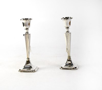 Lot 638 - A pair of hallmarked silver candlesticks