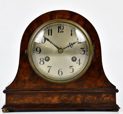 Lot 400 - A 1930s walnut mantel clock with silvered dial...