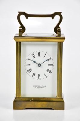 Lot 406 - GARRARD & CO LTD; a brass cased carriage clock,...