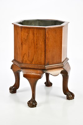 Lot 24 - A late 19th century octagonal oak cellarette...