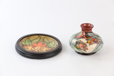 Lot 2337 - SALLY TUFFIN FOR MOORCROFT; a squat vase...