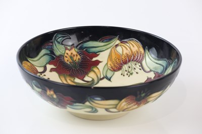 Lot 2343 - EMMA BOSSONS FOR MOORCROFT; a large footed...