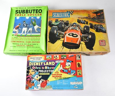 Lot 663 - Six boxed games comprising Scalextric Set 31,...
