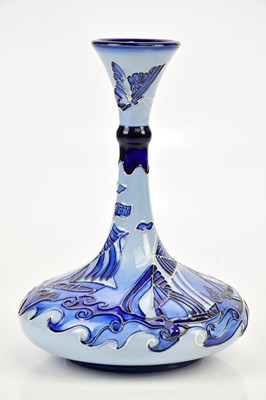 Lot 2223 - MOORCROFT; a modern ship's decanter shaped...
