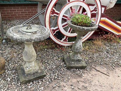 Lot 604 - A composite stone bird table and sun dial,...