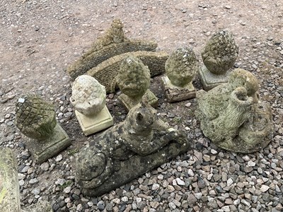 Lot 606 - Garden statuary including pin cone finials,...