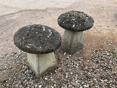 Lot 607 - A pair of composite staddle stones, height...