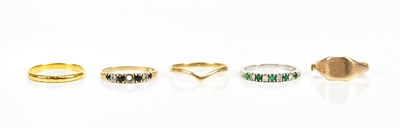 Lot 2406 - A 22ct gold wedding band, size N, a 9ct gold...