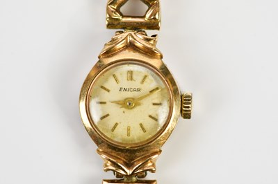 Lot 2298 - ENIGAR; a 9ct gold lady's wristwatch, set with...
