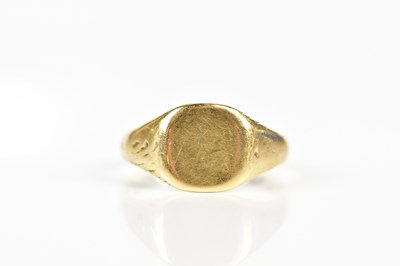 Lot 2422 - A 9ct yellow gold signet ring, size W, approx...